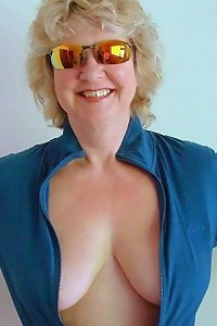 a lady has tit breasts and a stud is gargling on her nips